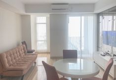 Common Space 3 Calm and Pleasant 2BR at Grand Sungkono Lagoon Apartment By Travelio