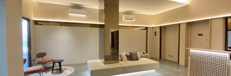Lobby Soft Minimalist Studio Room at Apartment Meikarta By Travelio