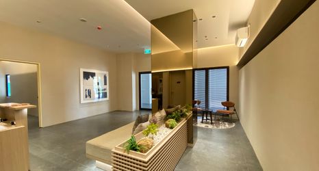 Lobby 2 Soft Minimalist Studio Room at Apartment Meikarta By Travelio