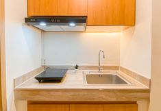 Common Space 6 Good Deal 2BR at Apartment Meikarta By Travelio