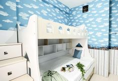 Bedroom 3 Compact 2BR near UNJ at Apartment Green Pramuka City By Travelio