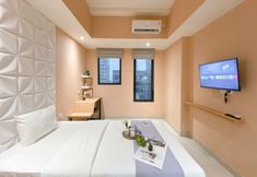 Others 2 Peach Tone Studio at Apartment Evenciio Margonda By Travelio