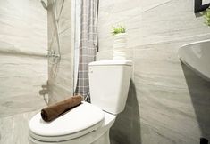 Others 3 Earth Toned Studio at Collins Boulevard Apartment By Travelio