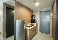 Others 2 Earth Toned Studio at Collins Boulevard Apartment By Travelio