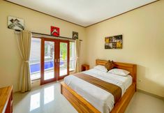 Bedroom 3 Urbanview Hotel Lilis Cempaka Mas Guesthouse