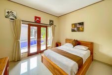 Bedroom Urbanview Hotel Lilis Cempaka Mas Guesthouse