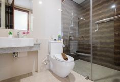 In-room Bathroom 6 Boho Touch 2BR Apartment with Extra Room at Lucky Tower Residence By Travelio
