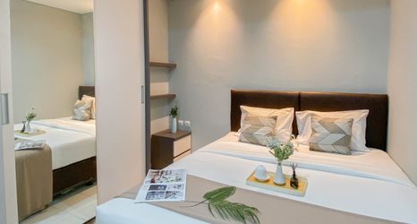 Bedroom 2 Modern and Homey 2BR at Patraland Urbano Apartment By Travelio