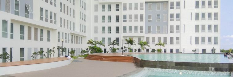 Lobby Modern and Homey 2BR at Patraland Urbano Apartment By Travelio