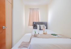 Bedroom 2 Strategic 2BR Grand Palace Kemayoran Apartment By Travelio