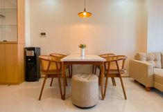 Ruang Umum 4 Warm Contemporary 2BR at Apartment Samara Suites By Travelio