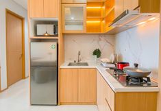 Ruang Umum 5 Warm Contemporary 2BR at Apartment Samara Suites By Travelio