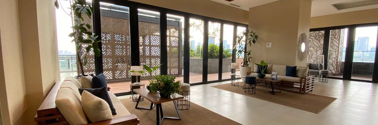 Lobi Modern Monochromatic 2BR near LRT Station at Samara Suites Apartment By Travelio