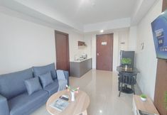 Common Space 3 Simple and Nice 1BR near Mall at Grand Sungkono Lagoon Apartment By Travelio