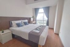 臥室 Simple and Nice 1BR near Mall at Grand Sungkono Lagoon Apartment By Travelio