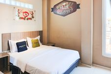 Bilik Tidur Urbanview Hotel Syariah Graha 8 Bubutan Surabaya