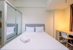 Kamar Tidur 2 Restful and Homey Studio LRT City Bekasi Apartment By Travelio