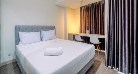 Kamar Tidur 2 Restful and Homey Studio LRT City Bekasi Apartment By Travelio