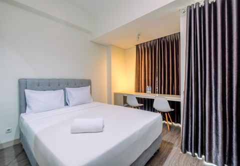 Kamar Tidur Restful and Homey Studio LRT City Bekasi Apartment By Travelio