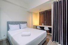 Kamar Tidur Restful and Homey Studio LRT City Bekasi Apartment By Travelio