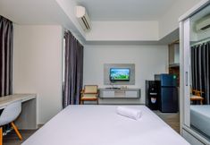 Kamar Tidur 3 Restful and Homey Studio LRT City Bekasi Apartment By Travelio