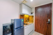 Ruang untuk Umum Restful and Homey Studio LRT City Bekasi Apartment By Travelio