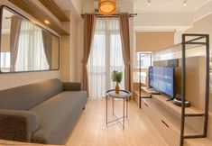 Ruang Umum 3 Tranquil and Cozy Studio Apartment Vasanta Innopark By Travelio