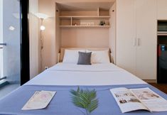 Bedroom 2 Cozy Studio at Apartment The Ayoma By Travelio