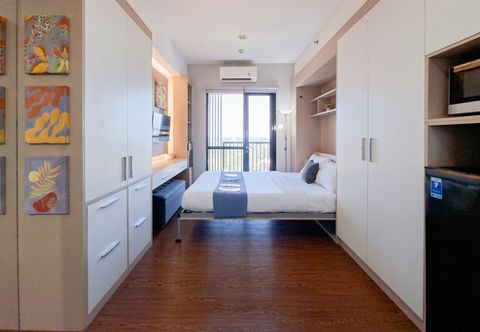 Bedroom Cozy Studio at Apartment The Ayoma By Travelio