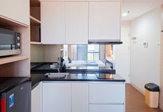 Common Space 4 Cozy Studio at Apartment The Ayoma By Travelio