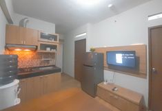 共用スペース 5 Basic Wood 2BR at Gateway Ahmad Yani Cicadas Apartment By Travelio