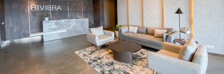 Lobby Simple and Bright 3BR at Apartment Meikarta By Travelio