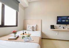 Others 3 White Accent Studio at Meikarta Apartment near Paramadina University By Travelio