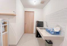 Others 3 Combined White Style 1BR (No Kitchen) Bandaraya - Tallasa City Makassar Apartment By Travelio