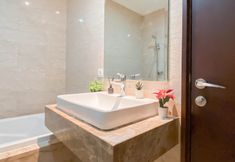 In-room Bathroom 6 2BR with Private Lift near Station at Apartment Menteng Park By Travelio