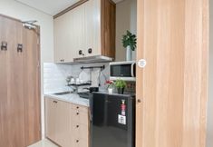 Common Space 5 Timeless Ambience Studio with Mountain View at Apartment Royal Sentul Park By Travelio