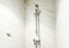 In-room Bathroom 6 Monochrome Style 1BR at Apartment Branz BSD City By Travelio
