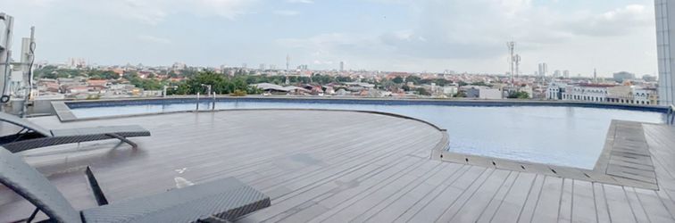 Lobby 2BR near Marvell City Mall at Apartment Linden By Travelio