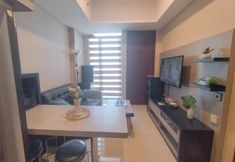 Common Space 3 2BR near Marvell City Mall at Apartment Linden By Travelio