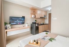 Bedroom 4 Nice Soft Ivory Studio at Royal Sentul Park Apartment  By Travelio