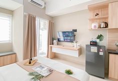 Bedroom 3 Nice Soft Ivory Studio at Royal Sentul Park Apartment  By Travelio