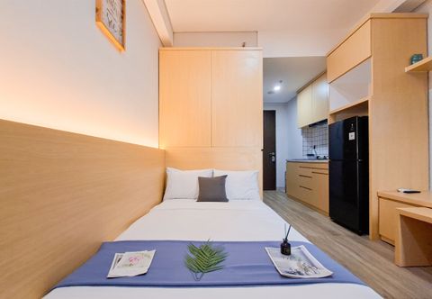 Bilik Tidur Warm Studio next to Mall at Transpark Bintaro Apartment By Travelio