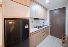 共用スペース 5 Modern Minimalist Studio Apartment at Transpark Bintaro By Travelio