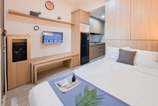 寝室 Modern Minimalist Studio Apartment at Transpark Bintaro By Travelio