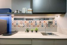 Ruang untuk Umum Cozy and Functional 1BR at Collins Boulevard Apartment By Travelio