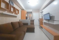 公共空間 3 Modern 2BR near UNPAR at Parahyangan Residence Apartment by Travelio