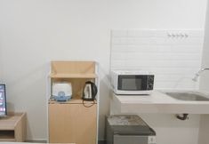 Common Space 6 Basic Studio (No Kitchen) at Bandaraya Apartment - Tallasa City Makassar By Travelio