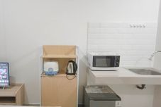 Common Space Basic Studio (No Kitchen) at Bandaraya Apartment - Tallasa City Makassar By Travelio