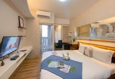 Bedroom 3 Well Furnished Studio at Green Bay Pluit Apartment with Seaview By Travelio