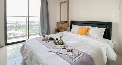 Bedroom 2 Simple Look and Tidy Studio Apartment at Daan Mogot City By Travelio